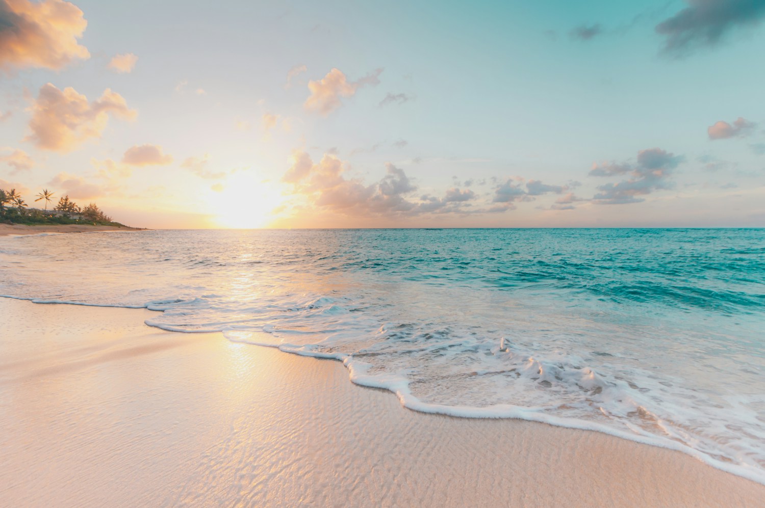 Beach and blue sea; illustrative photograph