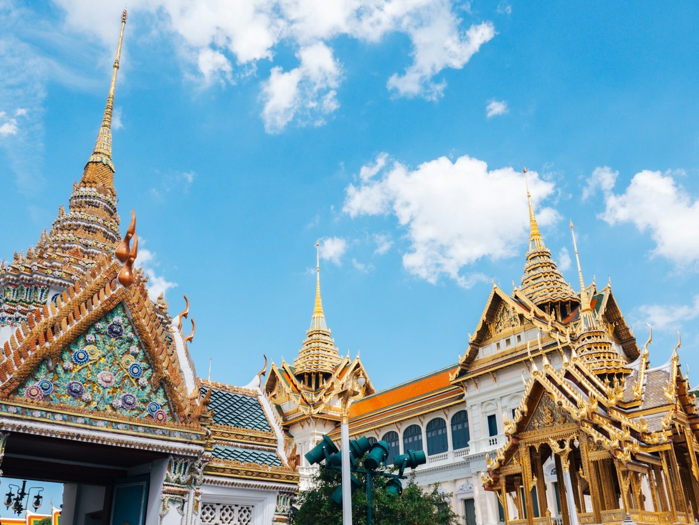 Ornate rooftops and spires at the Grand Palace in Bangkok.