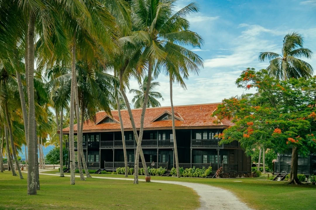 Malay-style chalets in Pelangi’s gardens.