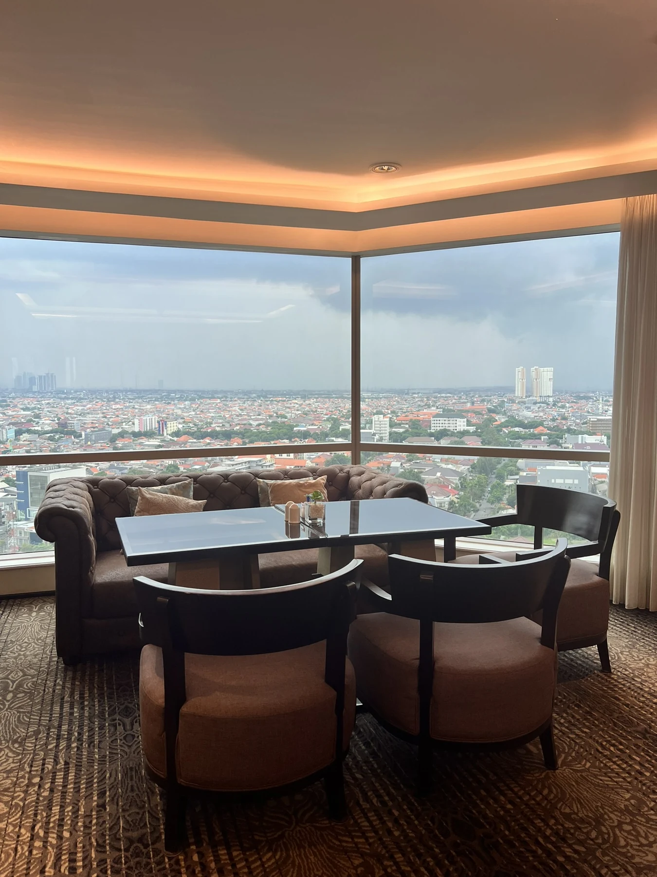A seating area overlooking the city during the Surabaya stay.