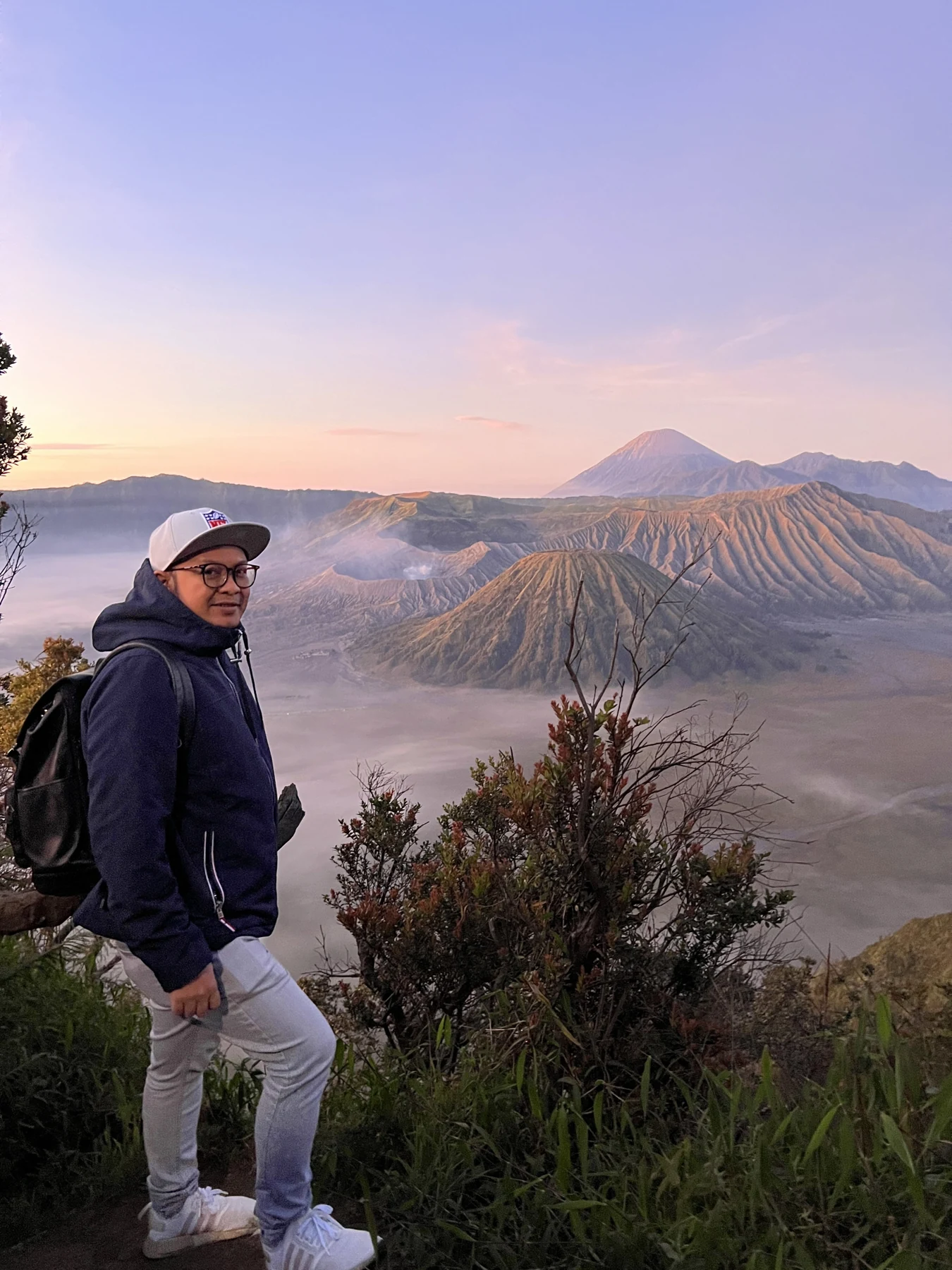 At the sunrise viewpoint, with the Bromo landscape behind.